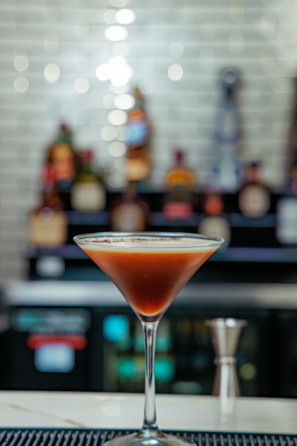 Espresso martini with cinnamon dusting