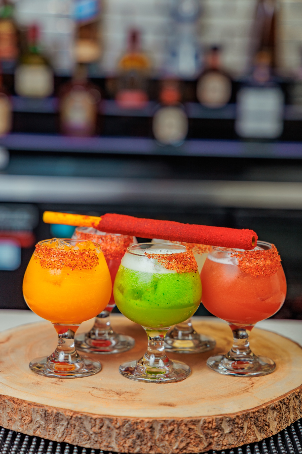 Flight of frozen chamoy-rimmed margaritas at Doña Luisa's bar